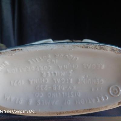 Old Charter bottle and Jim Beam King Kamehameha Decanter