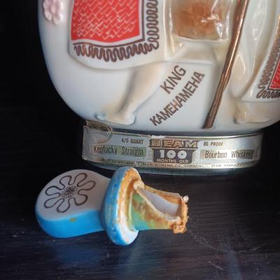 Old Charter bottle and Jim Beam King Kamehameha Decanter