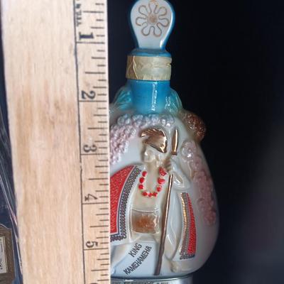 Old Charter bottle and Jim Beam King Kamehameha Decanter