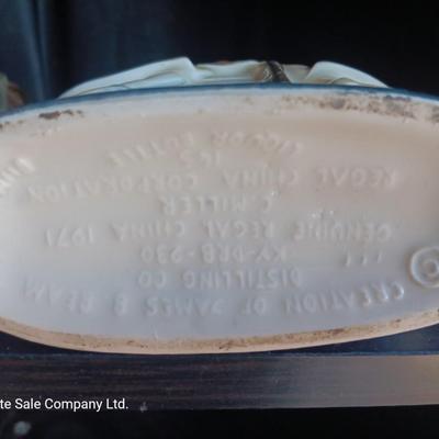 Old Charter bottle and Jim Beam King Kamehameha Decanter