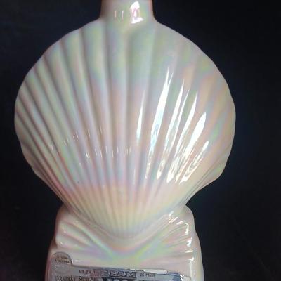 Jim Beam Florida seashell decanter with vintage Velvet tobacco tin