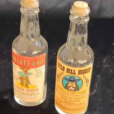 Vintage Beer cans with Humorous salt & pepper Kwyatt Urp and Wild Bill Hiccup salt & pepper shakers