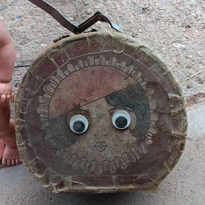 Vintage toy buggy stroller with baby doll and luggage of doll clothes