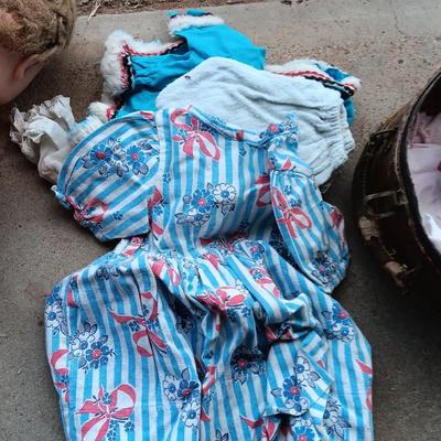 Vintage toy buggy stroller with baby doll and luggage of doll clothes