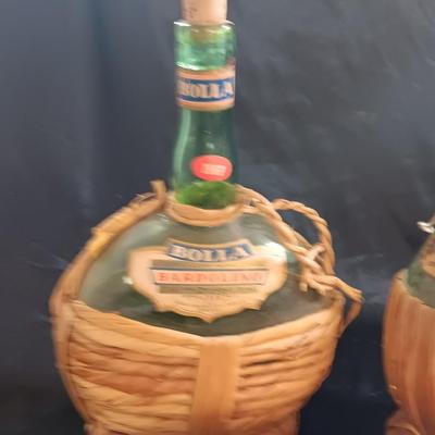Two wicker covered Italian alcohol bottles with Florida Oranges salt & Pepper shakers