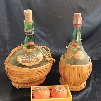 Two wicker covered Italian alcohol bottles with Florida Oranges salt & Pepper shakers