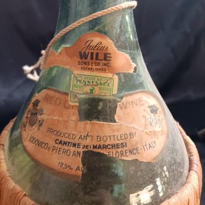 Two wicker covered Italian alcohol bottles with Florida Oranges salt & Pepper shakers