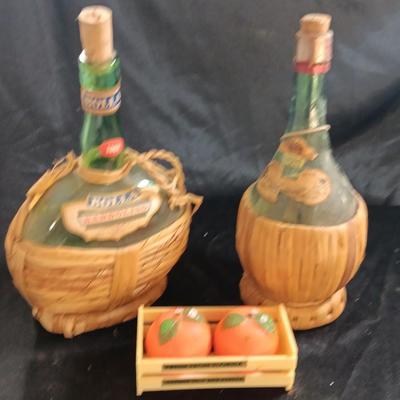 Two wicker covered Italian alcohol bottles with Florida Oranges salt & Pepper shakers