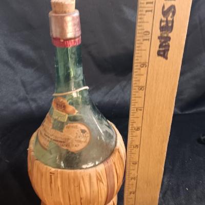 Two wicker covered Italian alcohol bottles with Florida Oranges salt & Pepper shakers