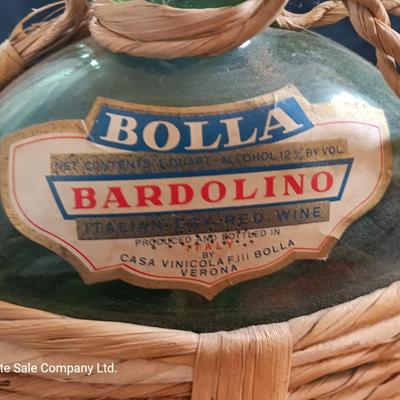 Two wicker covered Italian alcohol bottles with Florida Oranges salt & Pepper shakers