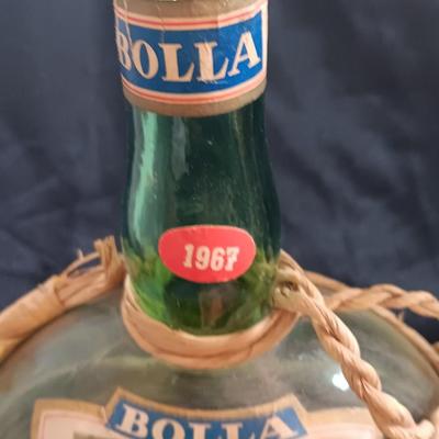 Two wicker covered Italian alcohol bottles with Florida Oranges salt & Pepper shakers