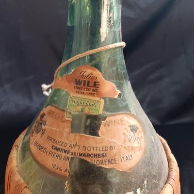 Two wicker covered Italian alcohol bottles with Florida Oranges salt & Pepper shakers