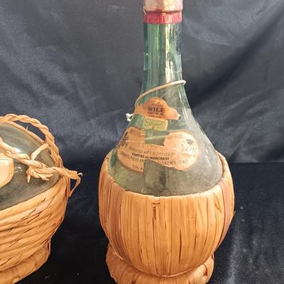 Two wicker covered Italian alcohol bottles with Florida Oranges salt & Pepper shakers