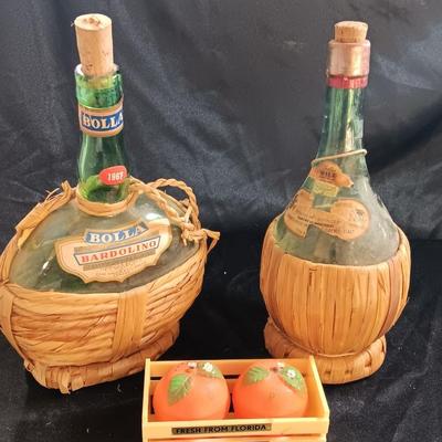 Two wicker covered Italian alcohol bottles with Florida Oranges salt & Pepper shakers