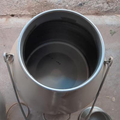 Stainless steel Milking machine - bucket - with hoses and a cream separator