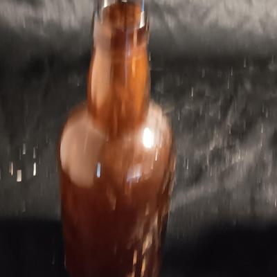 Sombrero man Salt & pepper shakers with brown bottles and small crock