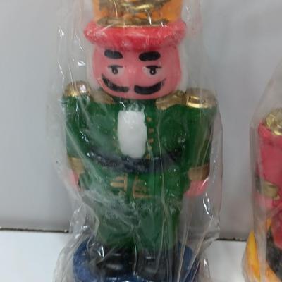 Three Nutcracker Decorative colored candles