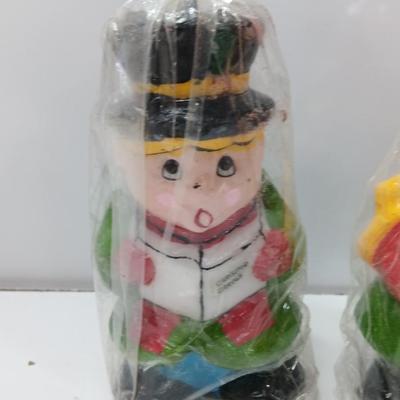 Two vintage Caroler wax decorative candles marked INTERPUR