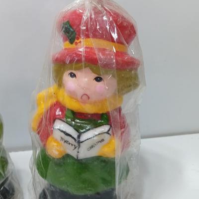 Two vintage Caroler wax decorative candles marked INTERPUR