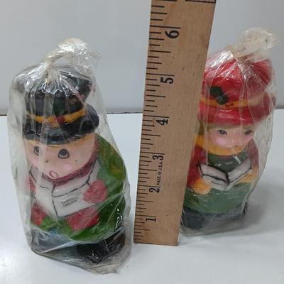 Two vintage Caroler wax decorative candles marked INTERPUR