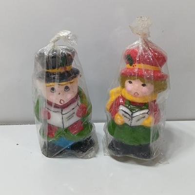 Two vintage Caroler wax decorative candles marked INTERPUR
