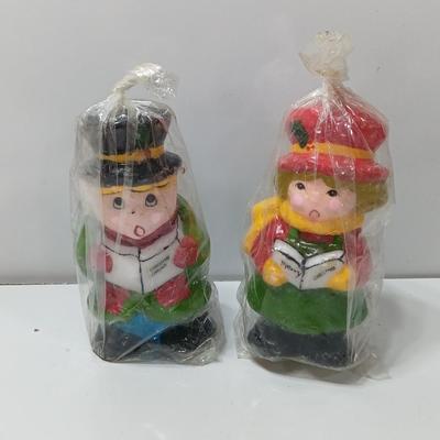 Two vintage Caroler wax decorative candles marked INTERPUR