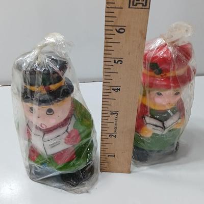 Two vintage Caroler wax decorative candles marked INTERPUR