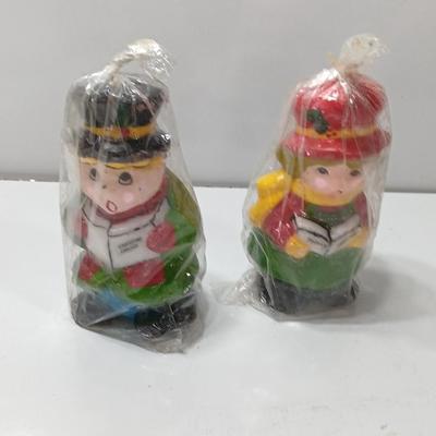 Two vintage Caroler wax decorative candles marked INTERPUR