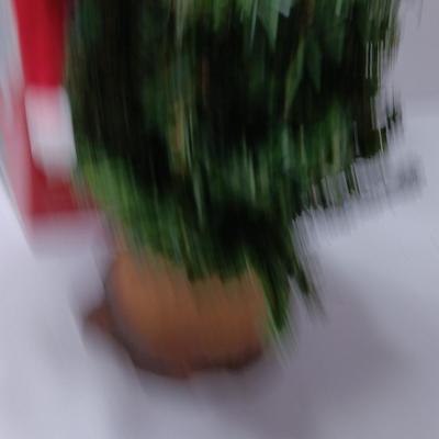 Gemmy Dancing Douglas Fir Sings and talks Opens eyes and lights up