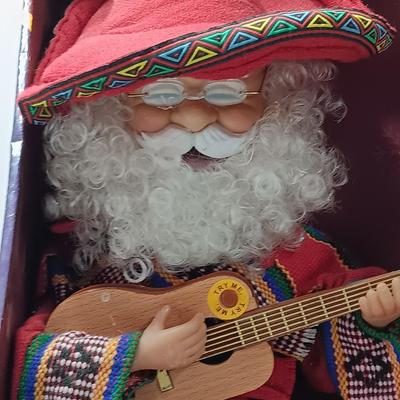 Holiday Time working Singing animated Santa - Feliz Navidad to all the children of the world!