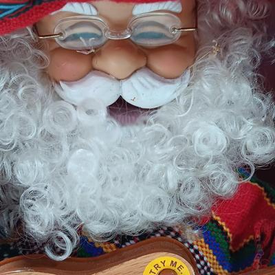 Holiday Time working Singing animated Santa - Feliz Navidad to all the children of the world!