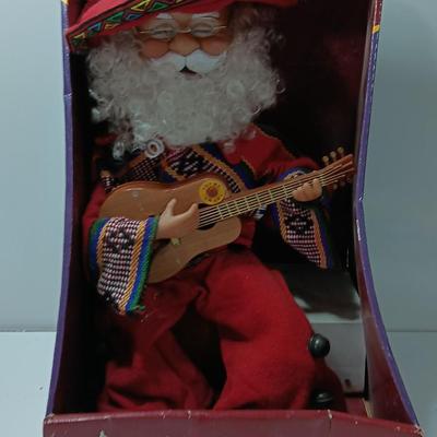 Holiday Time working Singing animated Santa - Feliz Navidad to all the children of the world!