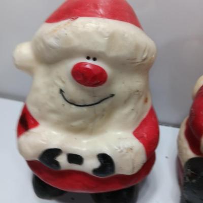 Vintage wax colored candle Santa's with a couple that aren't vintage