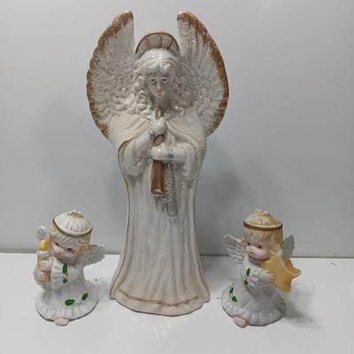 Large angel with glitter wings and two smaller angel figures