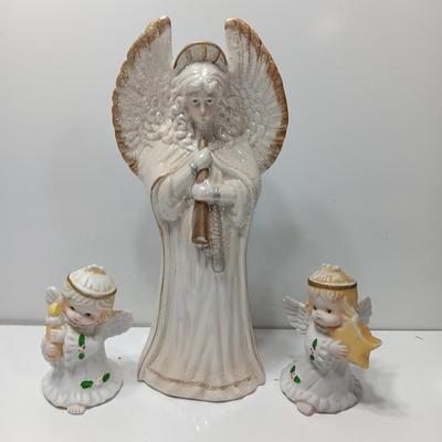 Large angel with glitter wings and two smaller angel figures