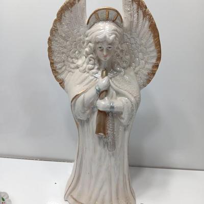 Large angel with glitter wings and two smaller angel figures