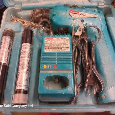 Makita Battery operated drill driver  6012HD with Fast charger, batteries and case.
