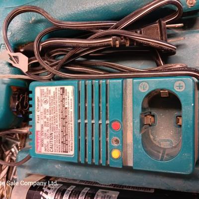 Makita Battery operated drill driver  6012HD with Fast charger, batteries and case.