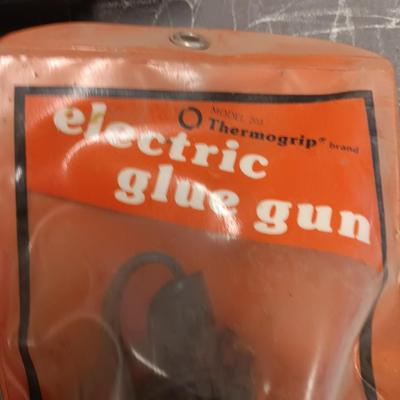 Milwaukee heat gun with electric glue gun and staple gun