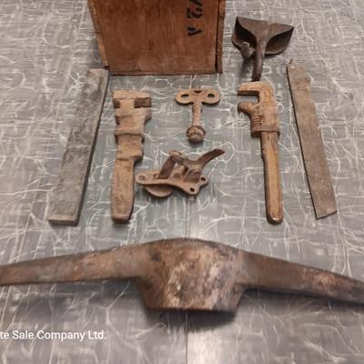 Wooden box with assortment of Antique rusty tools and hardware