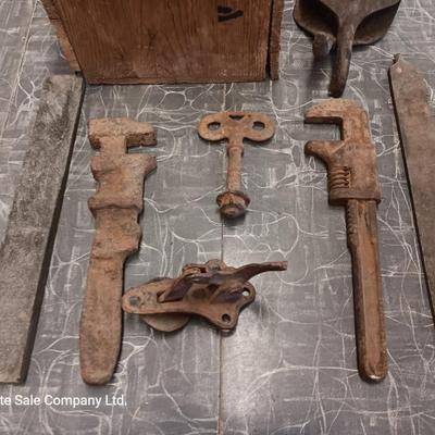 Wooden box with assortment of Antique rusty tools and hardware
