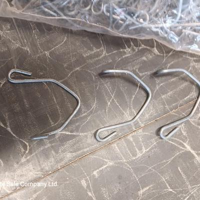 A bunch of T-Post clips for fencing 100+ new box full and several bags