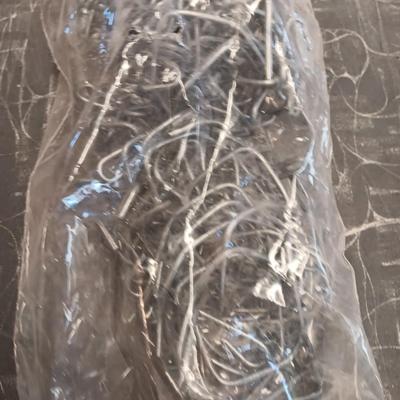A bunch of T-Post clips for fencing 100+ new box full and several bags