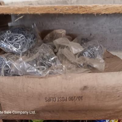 A bunch of T-Post clips for fencing 100+ new box full and several bags