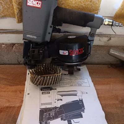 Senco Fastening systems SCN40R coil roofing Nailer with partial box of nails