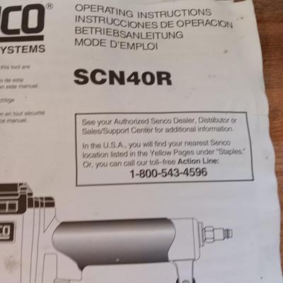 Senco Fastening systems SCN40R coil roofing Nailer with partial box of nails