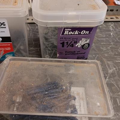 Assortment of hardware still in the boxes / tubs