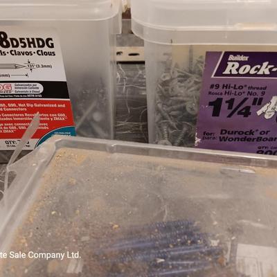 Assortment of hardware still in the boxes / tubs