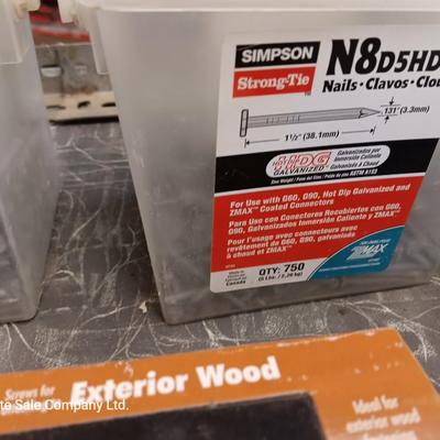 Assortment of hardware still in the boxes / tubs