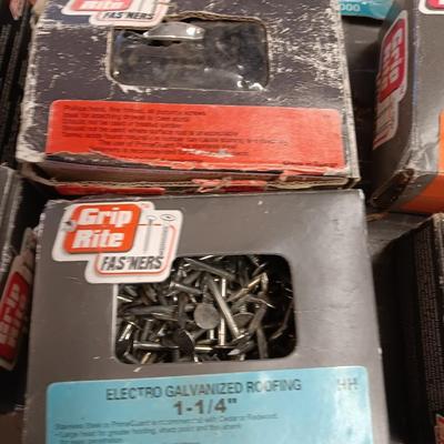 Assortment of hardware still in the boxes / tubs